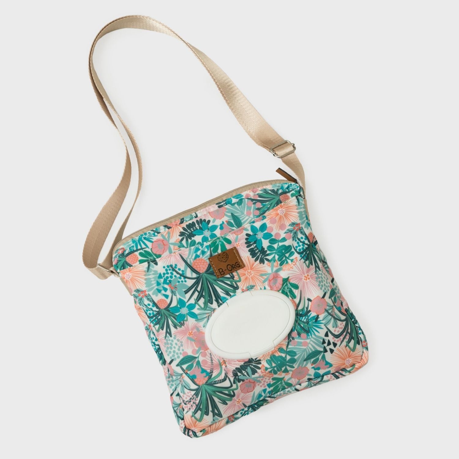 Cross Bag en print de Flores. Cartera versátil y cómoda para llevar tus esenciales y los esenciales de tu bebé para una salida rápida al parque, al banco o al súper, donde no necesitas muchas cosas pero debes lista para todo.