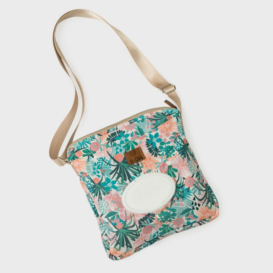 Cross Bag en print de Flores. Cartera versátil y cómoda para llevar tus esenciales y los esenciales de tu bebé para una salida rápida al parque, al banco o al súper, donde no necesitas muchas cosas pero debes lista para todo.