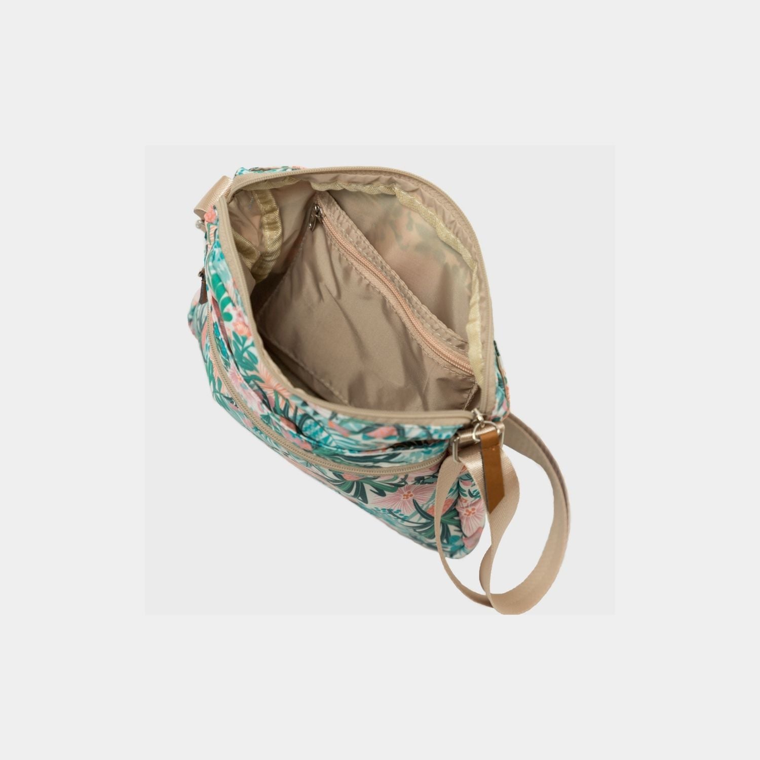 Cross Bag en print de Flores. Cartera versátil y cómoda para llevar tus esenciales y los esenciales de tu bebé para una salida rápida al parque, al banco o al súper, donde no necesitas muchas cosas pero debes lista para todo.